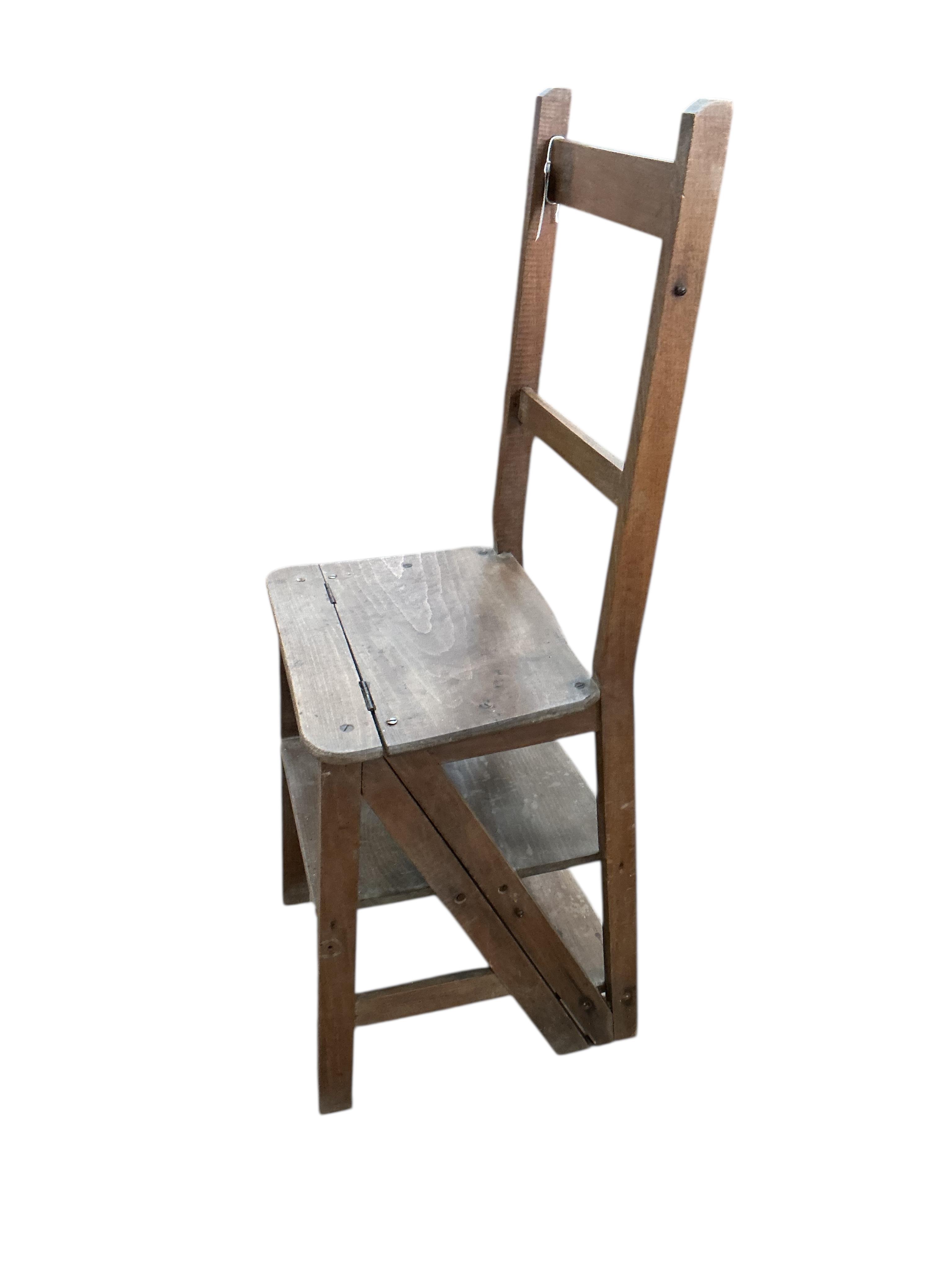 An early 20th century French Provincial beech metamorphic library chair, width 39cm, depth 33cm, height 84cm